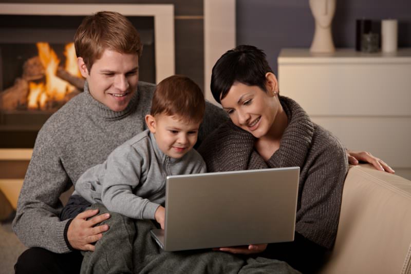 COST happy family with furnace shutterstock 62680984 e1539715806986 1