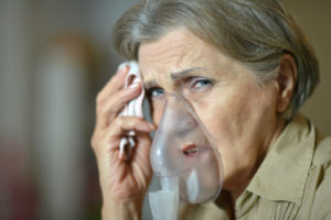 Asthma Woman Making Inhalation Shutterstock 168189116