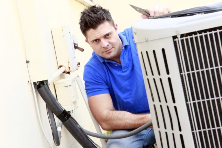 VIGILANT man checking ac shutterstock 73375426 e1550250768860 1
