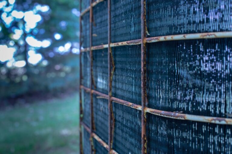 rusted AC cage min 1