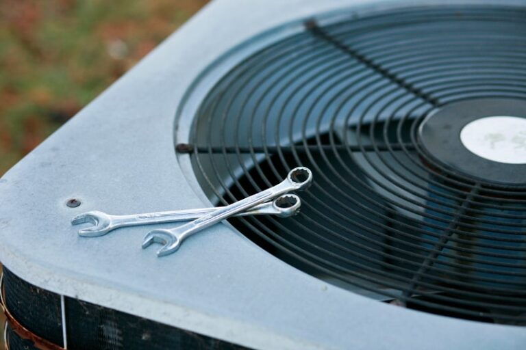 wrenches on top of AC unit min